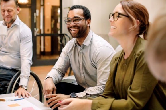 Employees laughing together