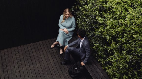 Two friends discussing